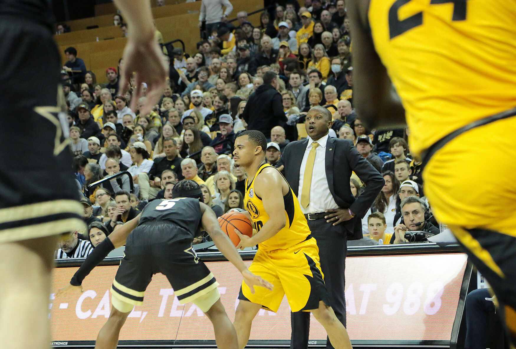 Nick Honor, center, looks for an open as head coach